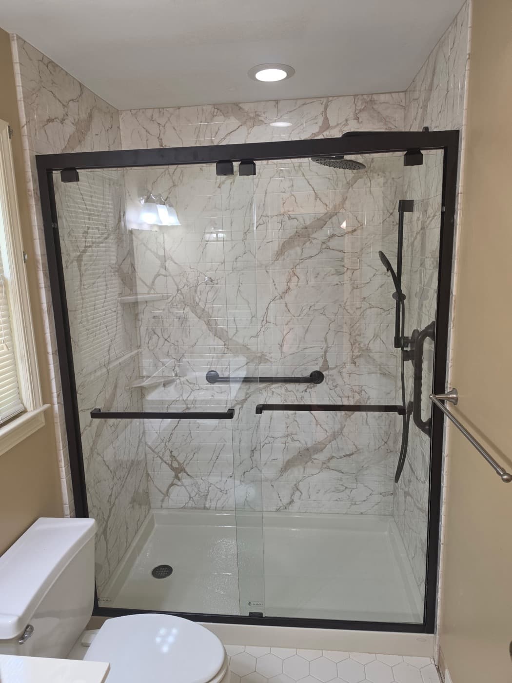 Walk-in shower remodel in Greenville, SC — the finished bathroom after a one-day Patriot Showers install