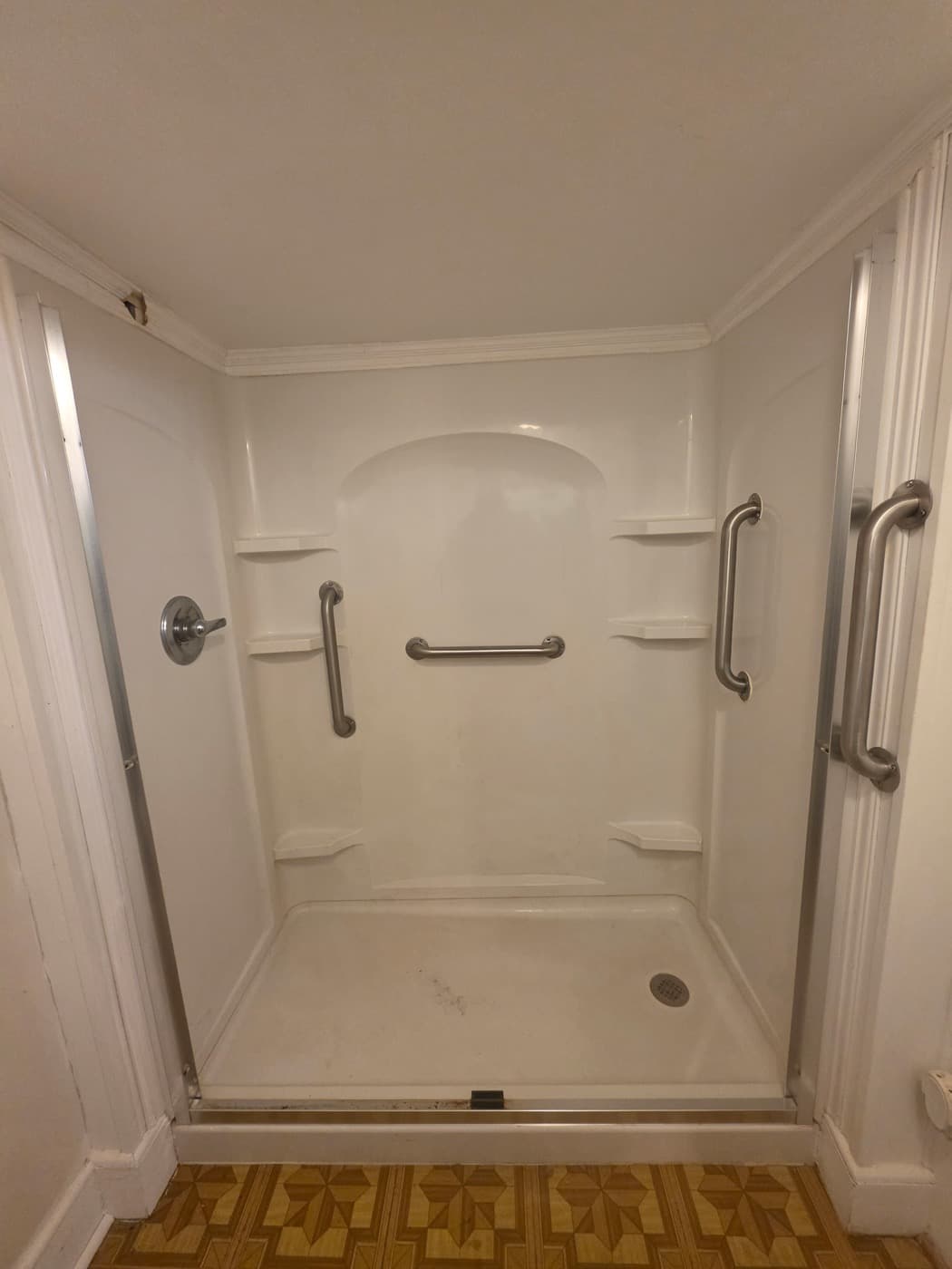 Walk-in shower remodel in Simpsonville, SC — the original bathroom before Patriot Showers started work