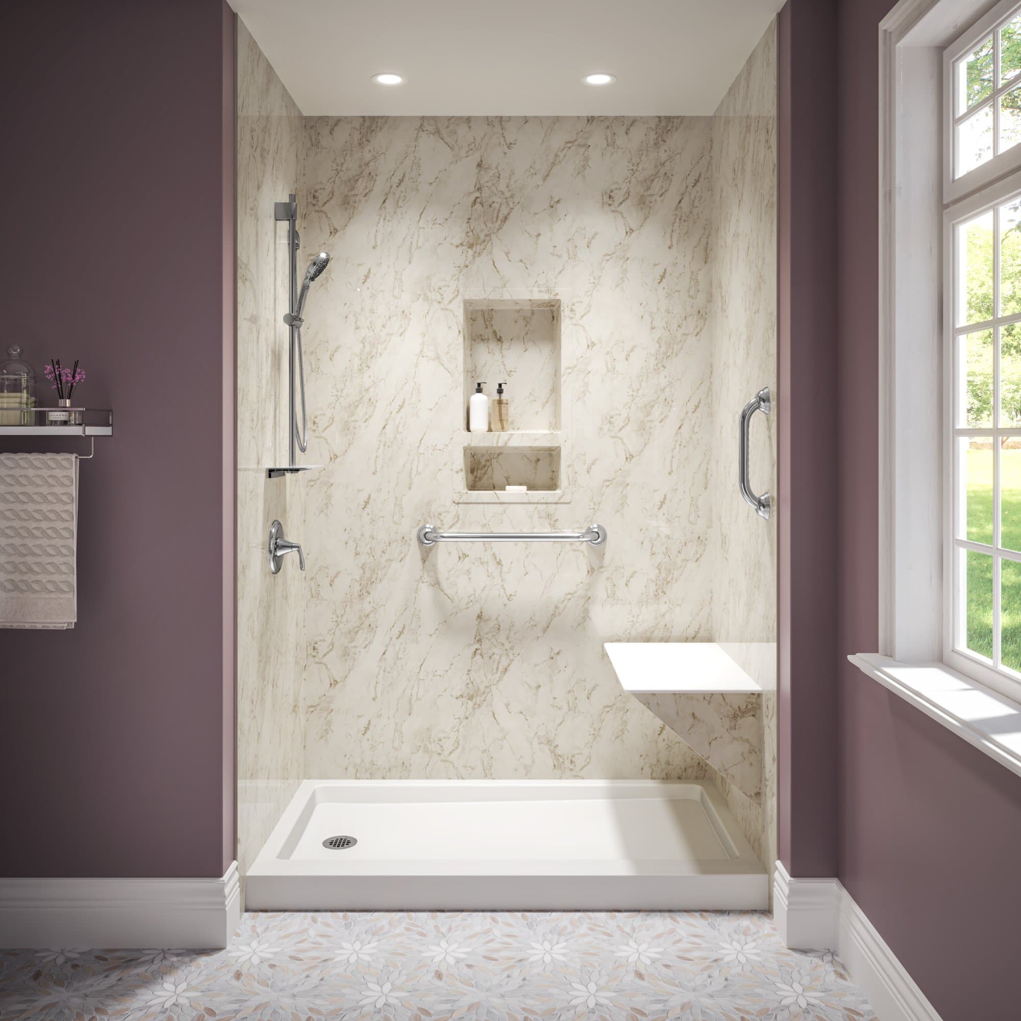 Elegant Coastal Sands shower with grab bars, niche, and fold-down bench
